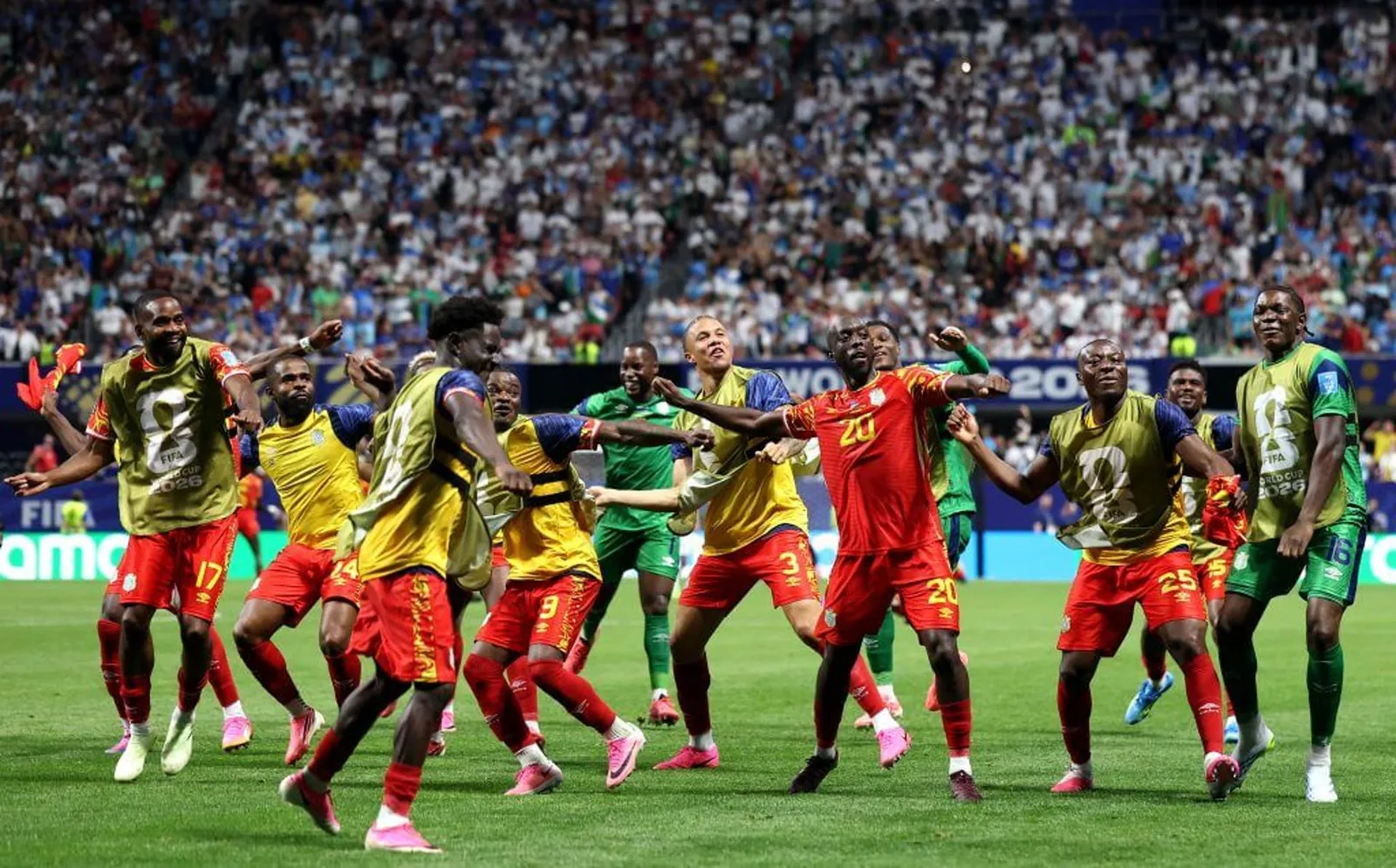 Yoane Wissa leads the celebrations after his second goal sealed a famous win