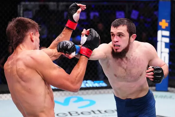 Magomed Zaynukov of Russia punches Lucas Caldas of Brazil in a lightweight fight during Dana White's Contender Series season nine, week nine at UFC APEX on October 07, 2025 in Las Vegas, Nevada. (Photo by Chris Unger/Zuffa LLC)