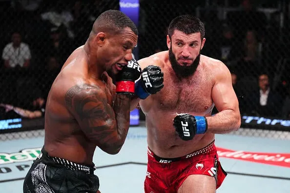 Rizvan Kuniev of Russia punches Jailton Almeida of Brazil in a heavyweight fight during the UFC Fight Night event at Meta APEX on February 07, 2026 in Las Vegas, Nevada. (Photo by Chris Unger/Zuffa LLC)