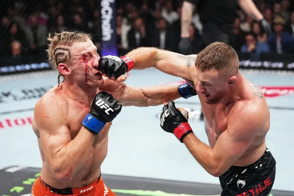 LAS VEGAS, NEVADA - JANUARY 24: (L-R) Justin Gaethje punches Paddy Pimblett of England in the UFC lightweight interim championship bout during the UFC 324 event at T-Mobile Arena on January 24, 2026 in Las Vegas, Nevada. (Photo by Chris Unger/Zuffa LLC)